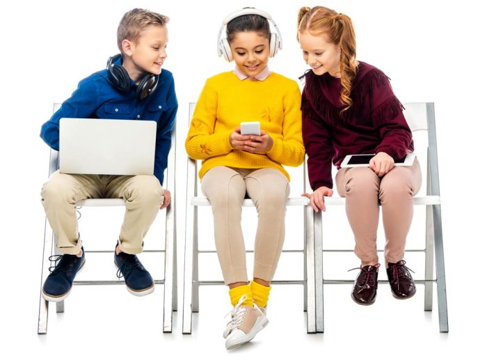 Kids holding digital devices