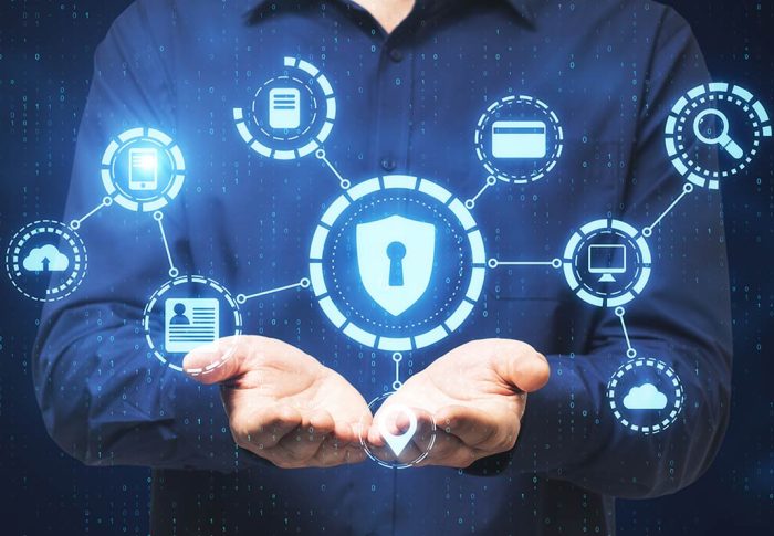 Open hands with cybersecurity icons